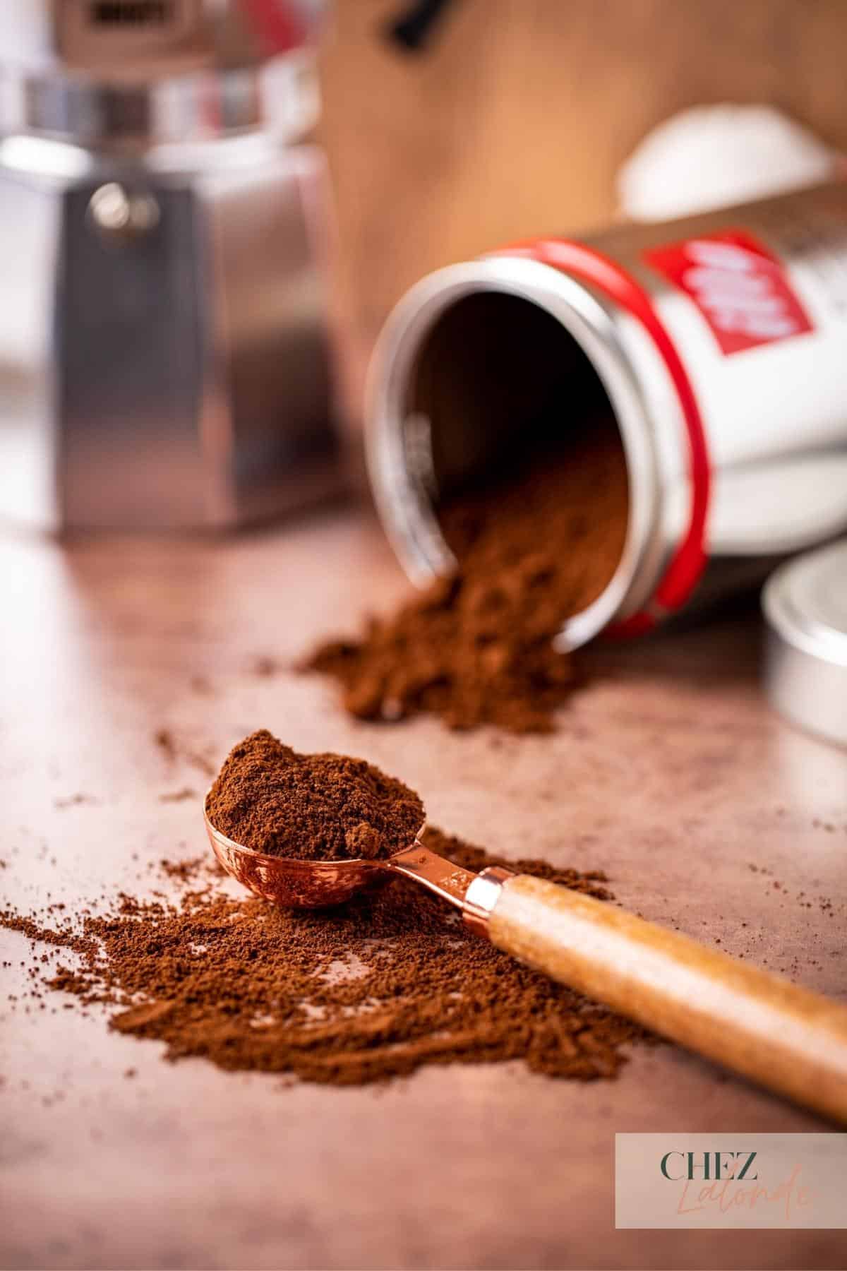 a tablespoon of illy coffee on the counter.