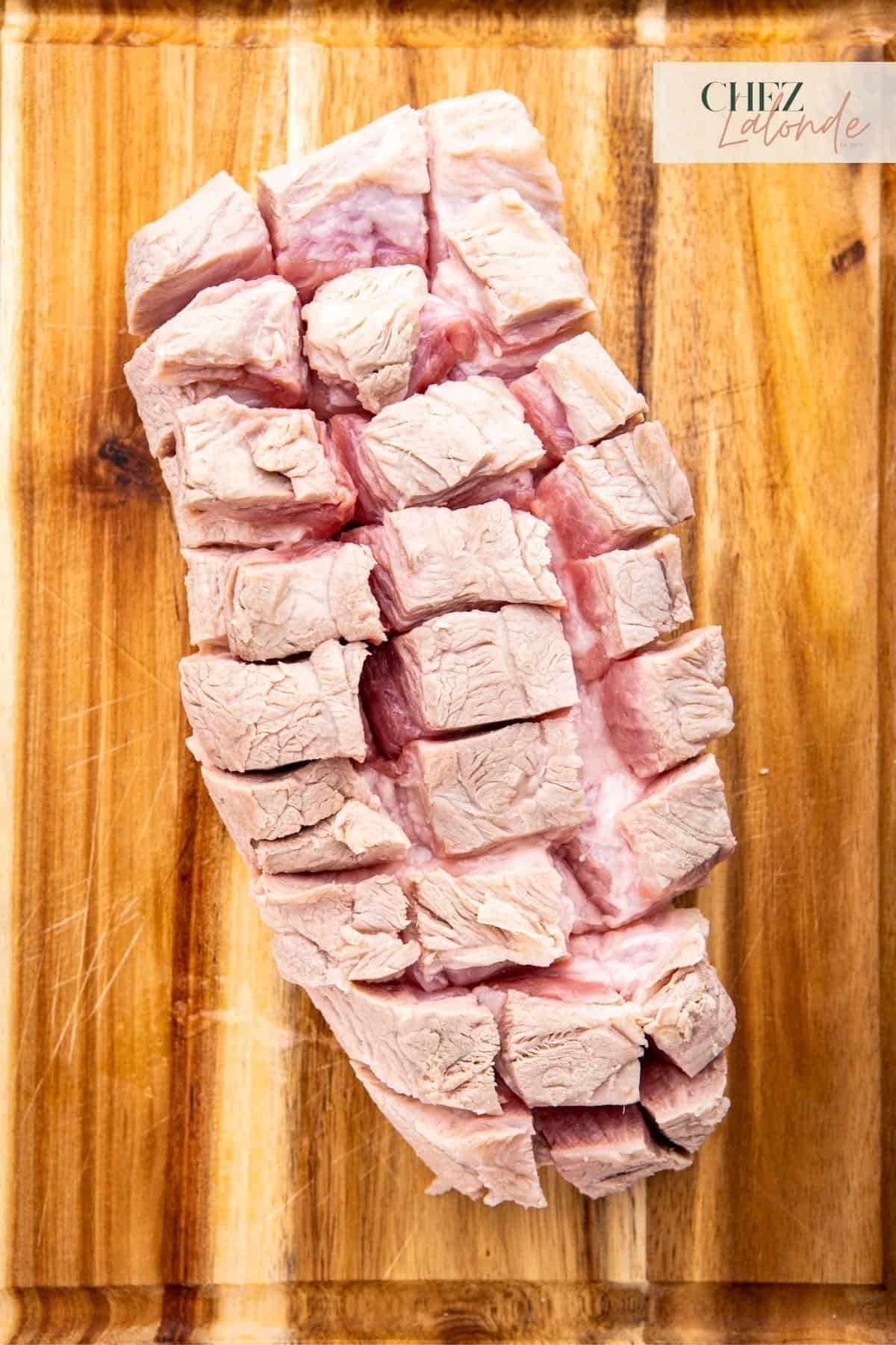 Cut the meat evenly to form a checking pattern that is around 1X1 inch square.