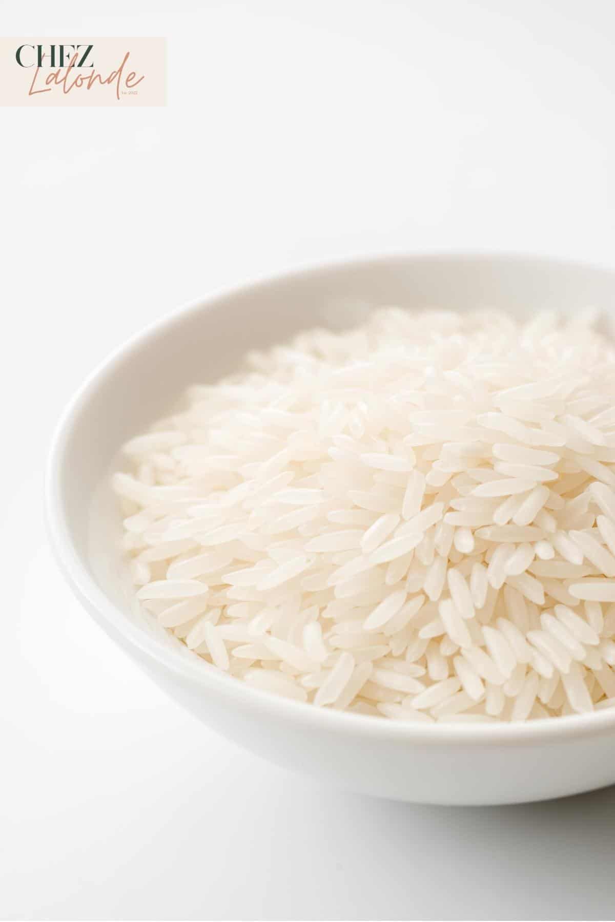 A bowl of uncooked Jasmine Rice.