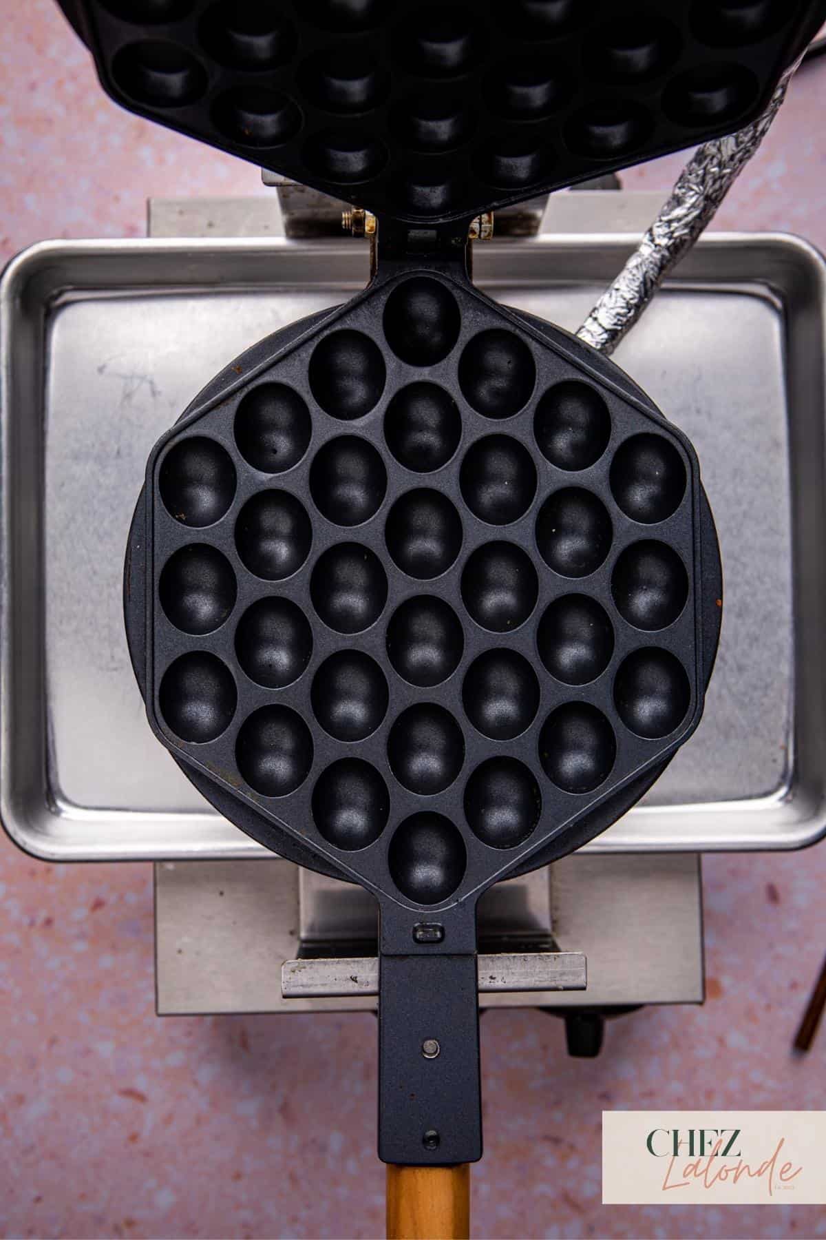 Step2: Once it is heated, open up the waffle iron.