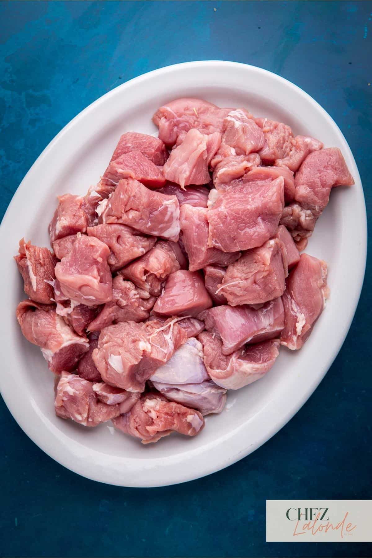 a plate of cut pork tenderloin.  