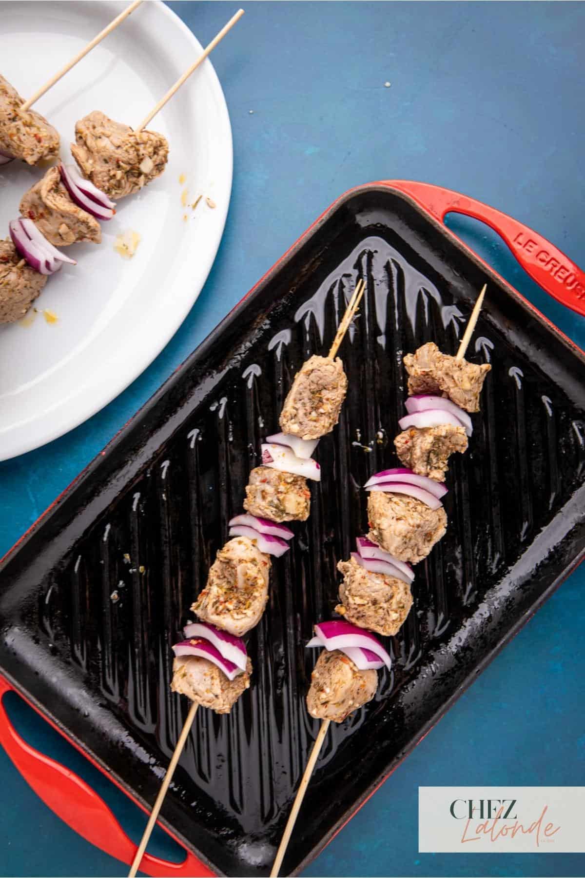 Grilling the skewer on the grill pan.