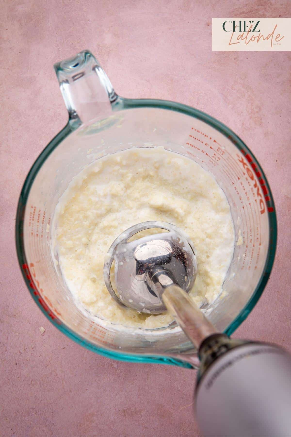 Use the immersion blender to blend and combine the ingredients until they form a thick paste.