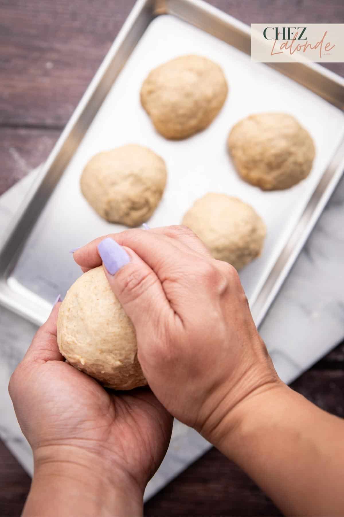 Based on the desired pita size, size the dough accordingly and form small dough balls using your hands.