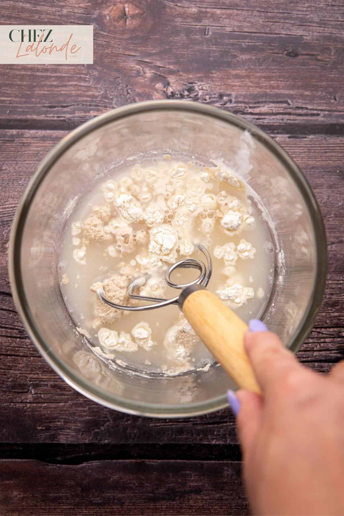 In a fresh bowl, combine 1 cup of lukewarm water (95 to 110F), 2 ¼ teaspoons of active dry yeast (or a packet), 2 tablespoons of sugar, and 2 tablespoons of all-purpose flour.
