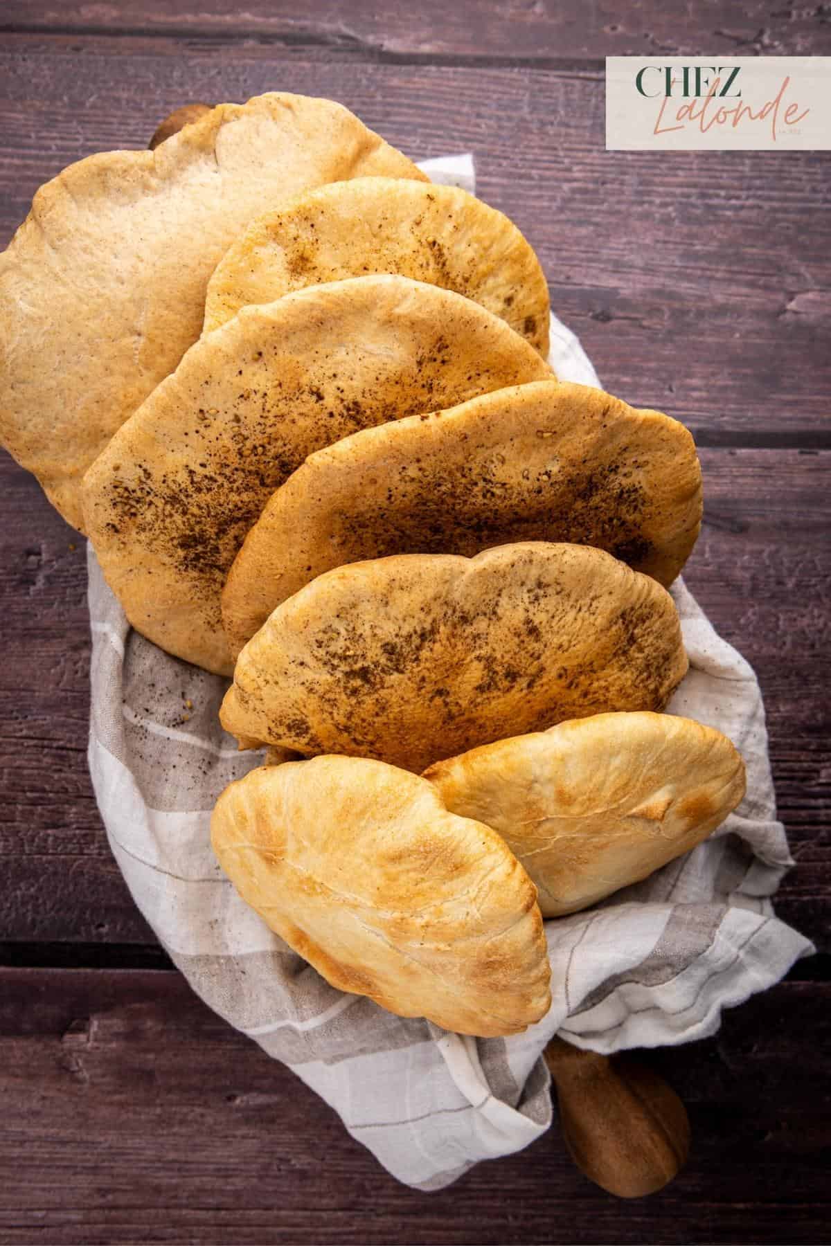 A basket full of air fryer pita bread. 