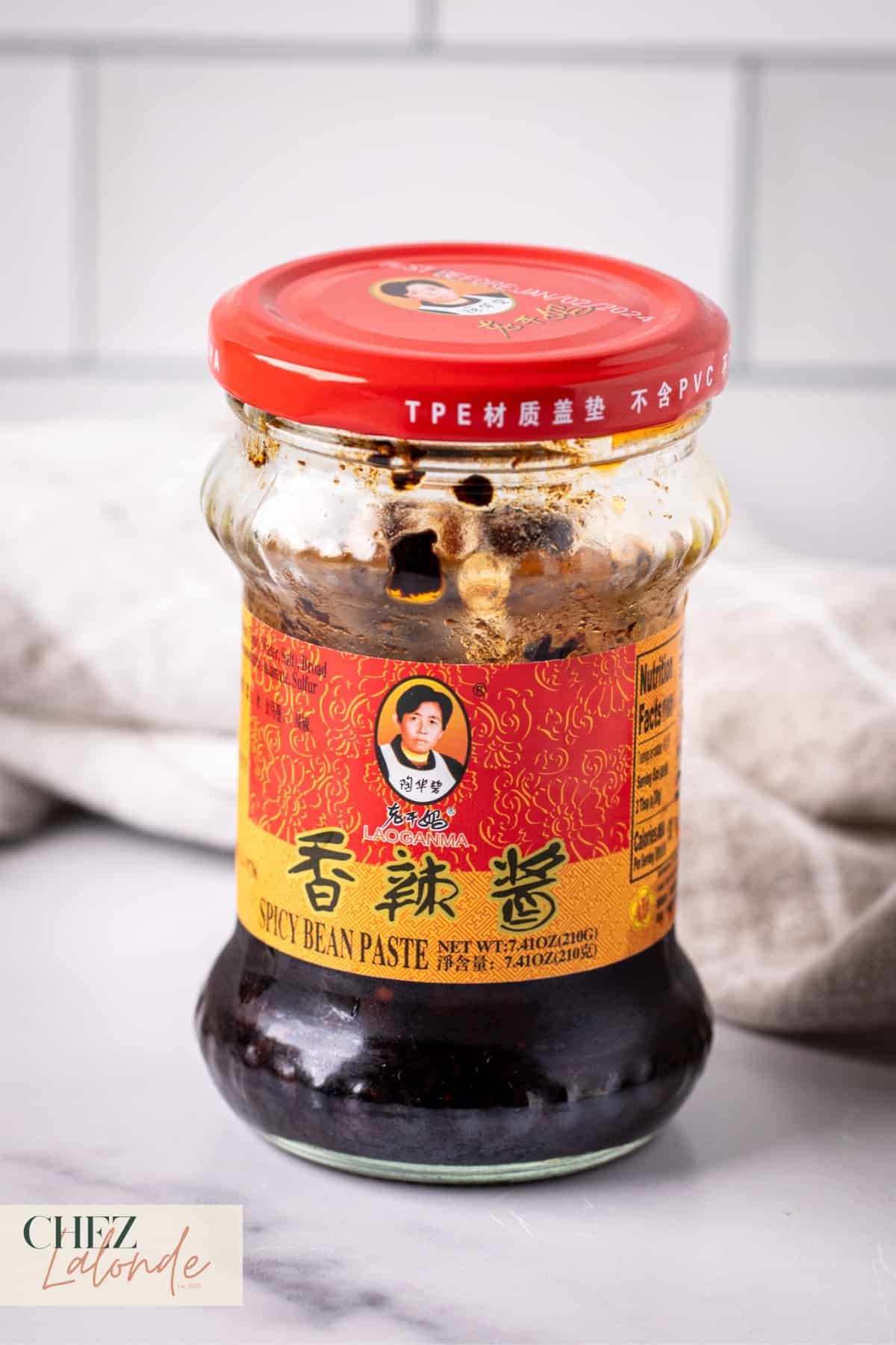 A jar of Chinese Lao Gan Ma Spicy Bean Paste.
