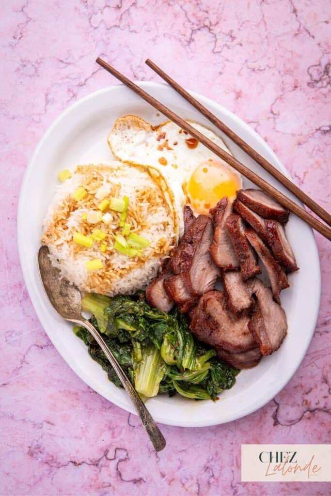 For the ultimate indulgence, serve it over rice or on a rice platter alongside steamed veggies. Top the experience with a perfectly cooked sunny-side-up egg and drizzle with soy sauce for additional flavor.