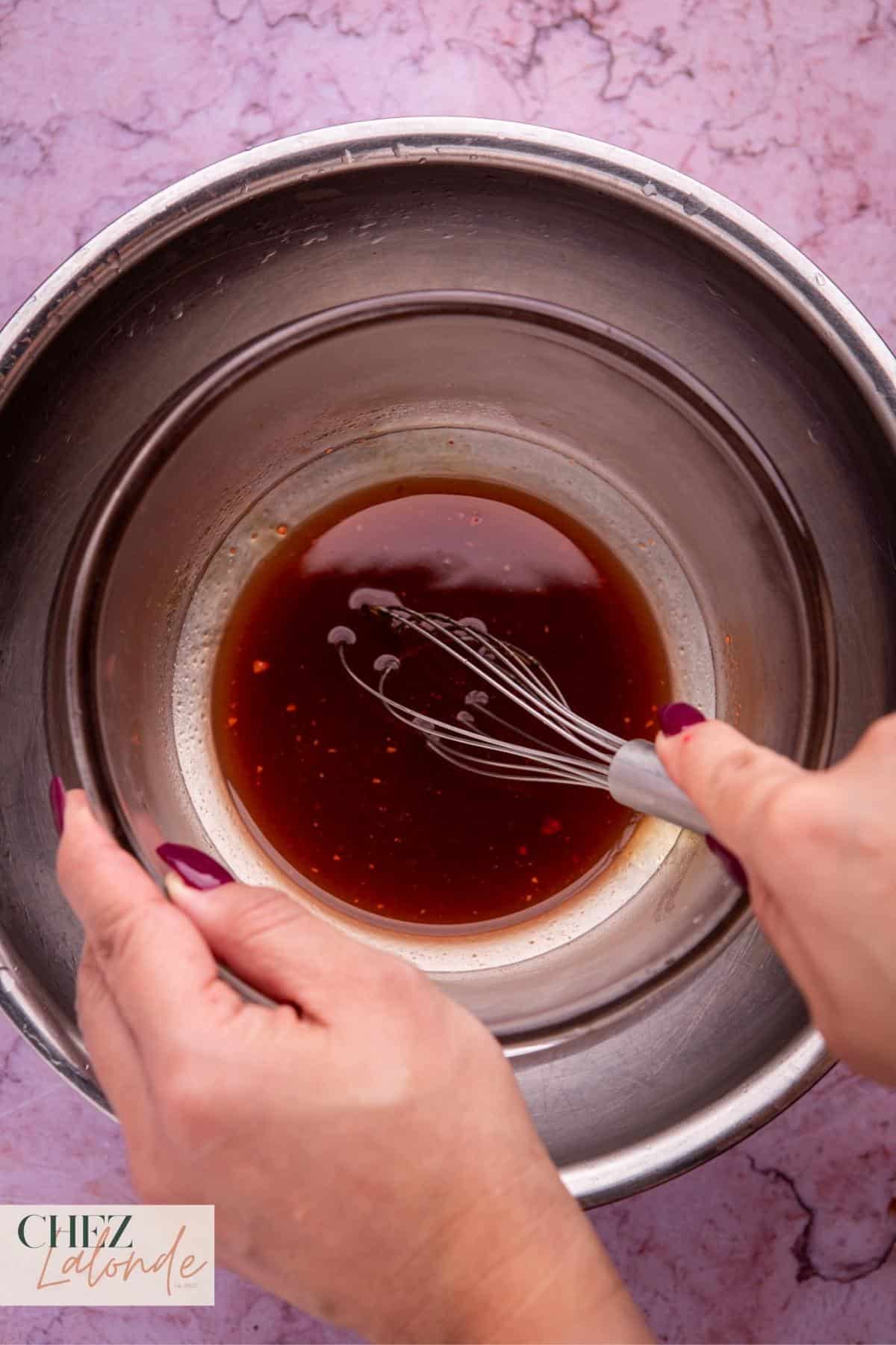 Note that maltose syrup tends to be thick and challenging to blend with the marinade. To ease this process, consider placing the mixing bowl in a warm water bath to help the syrup dissolve more swiftly. Whisk the mixture until a cohesive blend is achieved, then set it aside for future use.