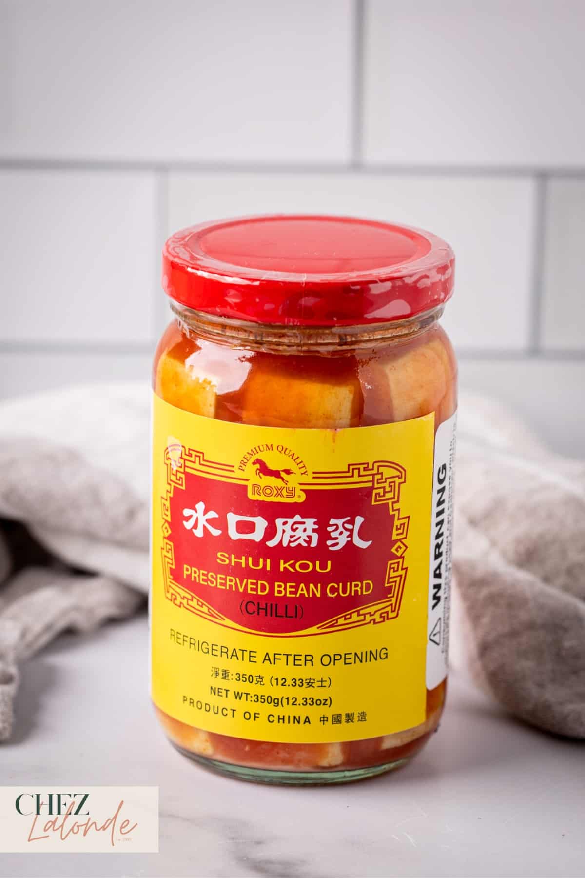 A jar of Preserved Chili bean Curd.