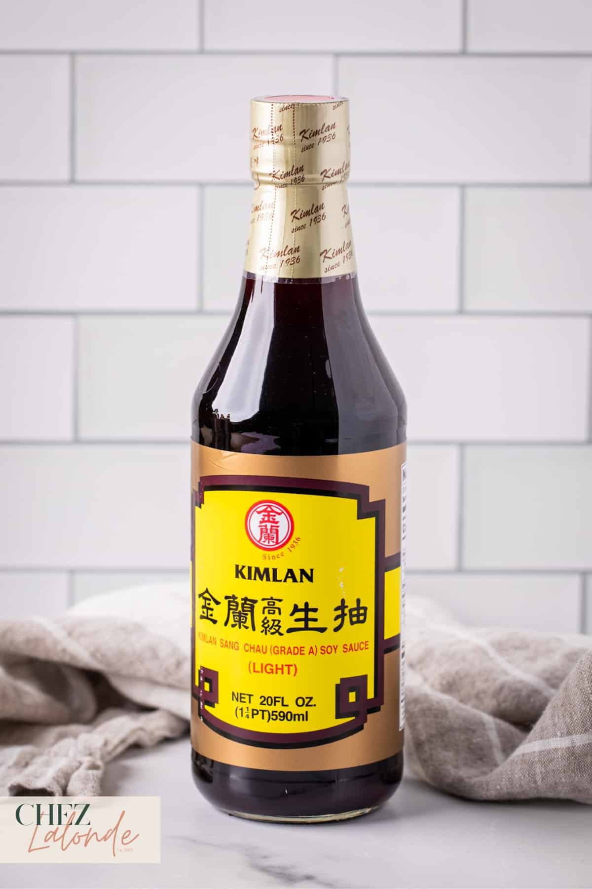 A bottle of Kimlan Soy Sauce. 