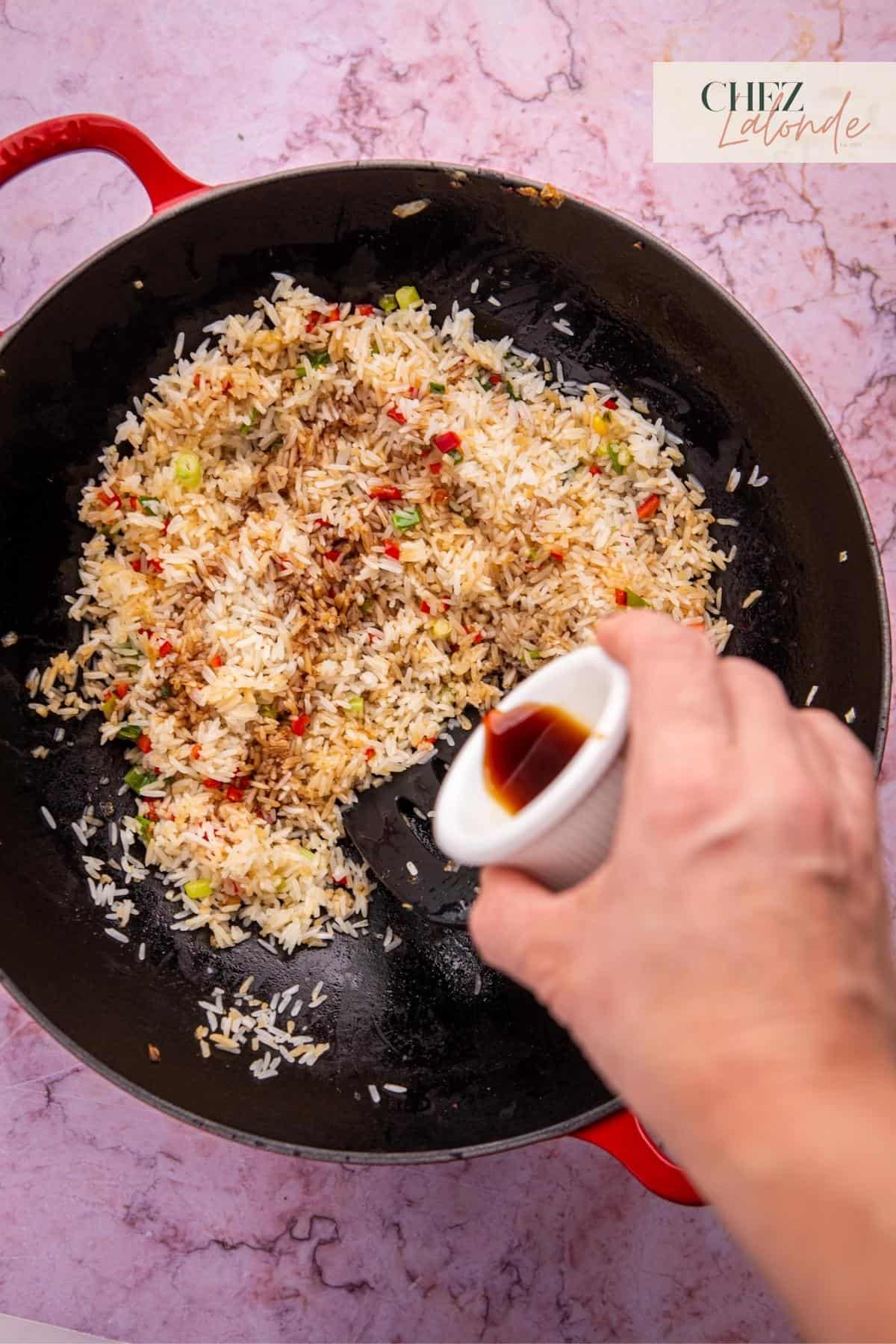 Add 3 tablespoons of regular soy sauce to the fried rice.