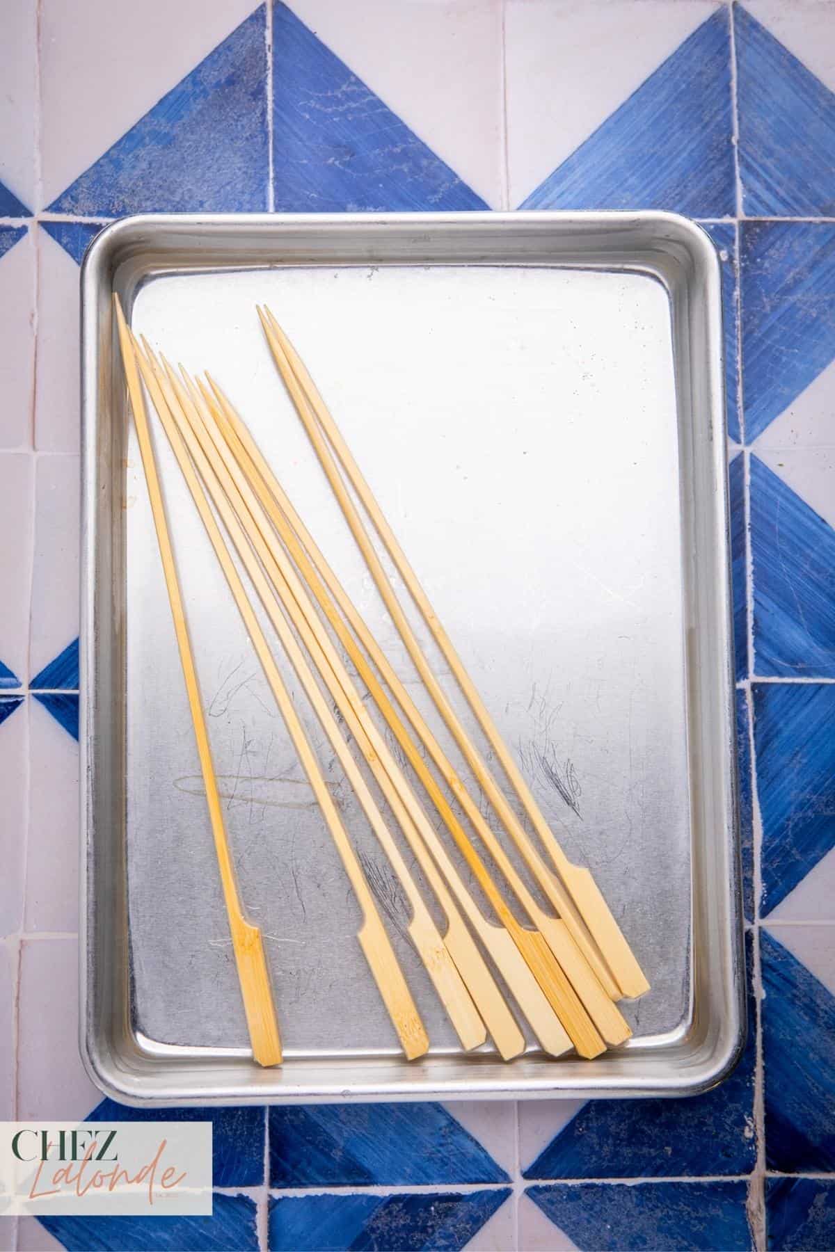 soak your wooden skewers in water for 30 minutes. This preps them for use in the air fryer and prevents unwanted charring.