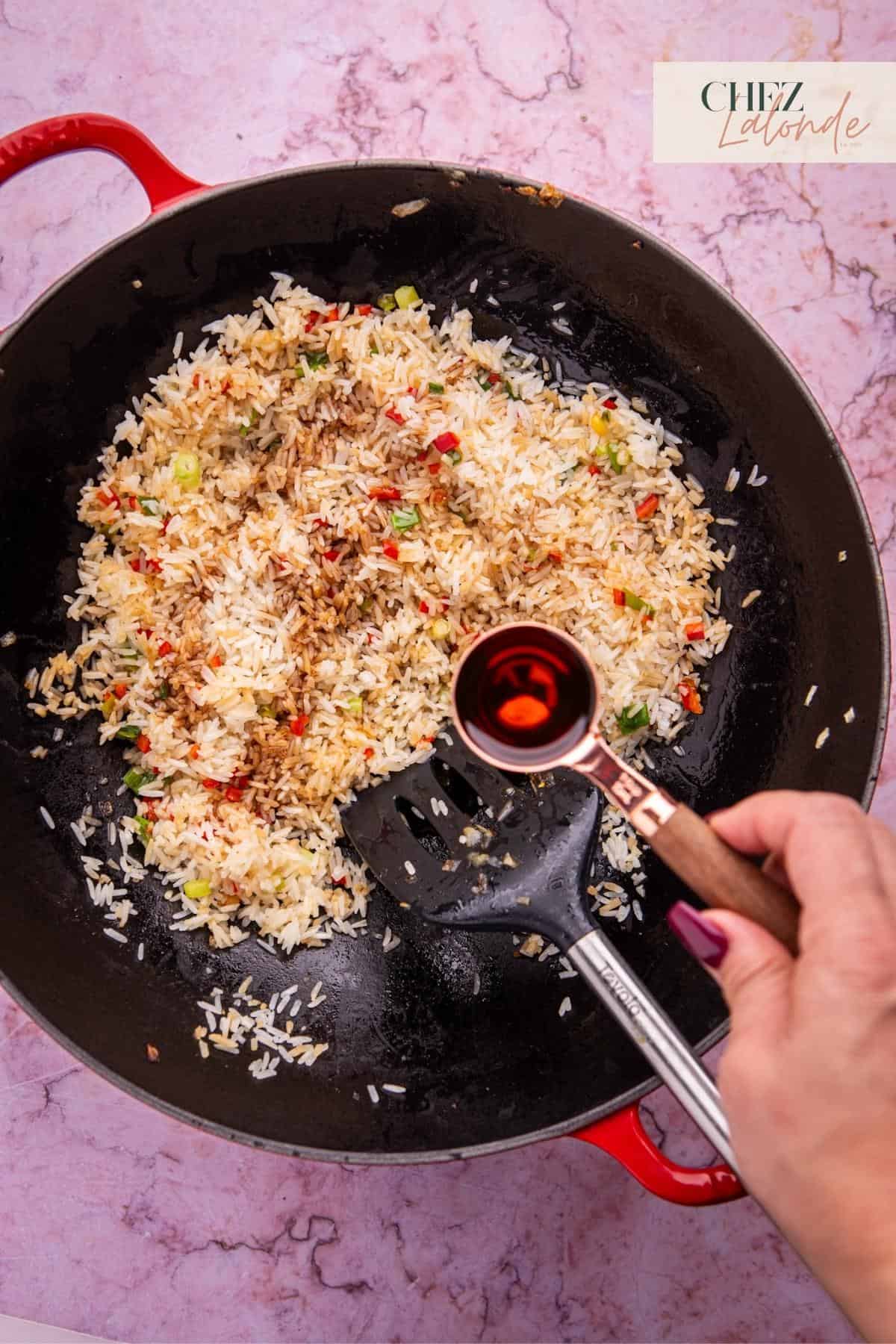 Add 2 tablespoons of sesame oil to fried rice.