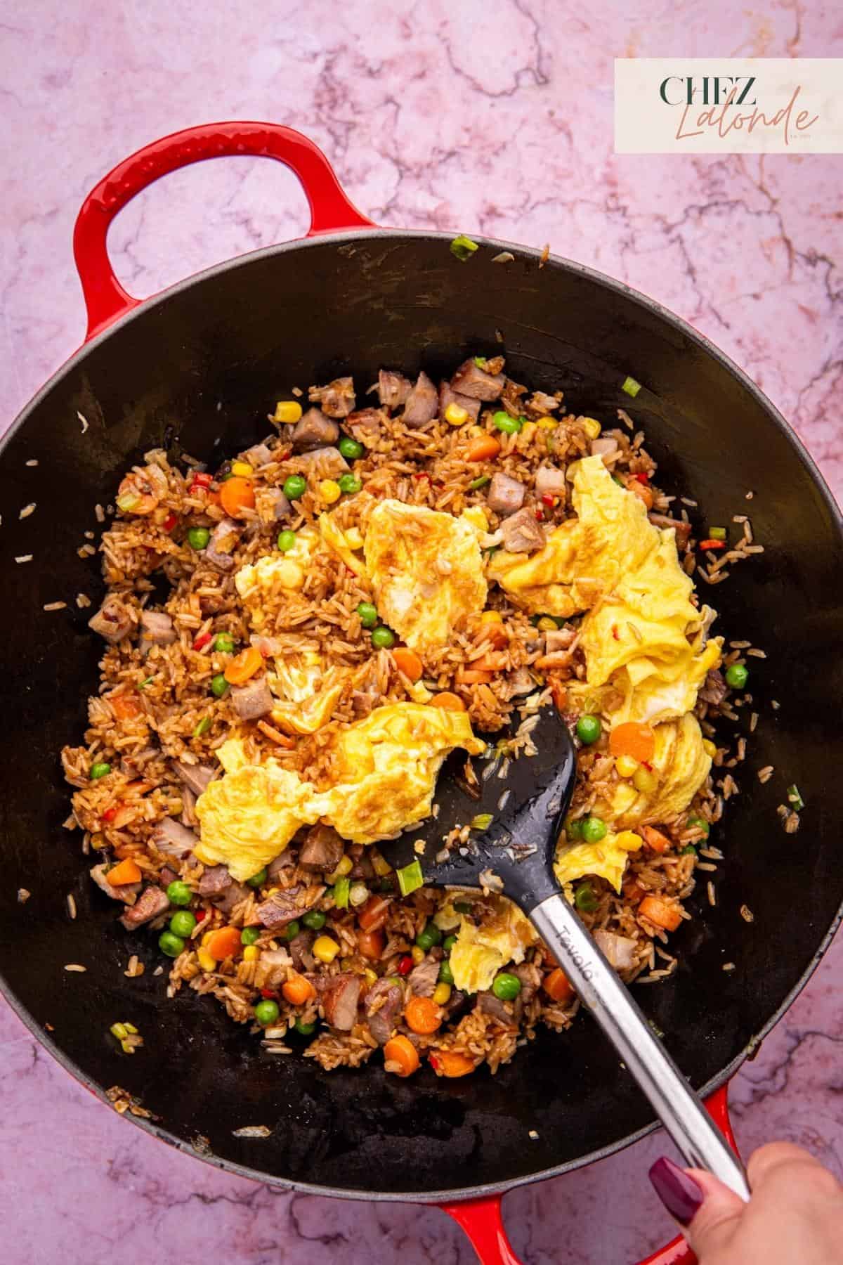 Use your spatula to break apart the eggs and stir-fry the mixture for 1 to 2 more minutes.
