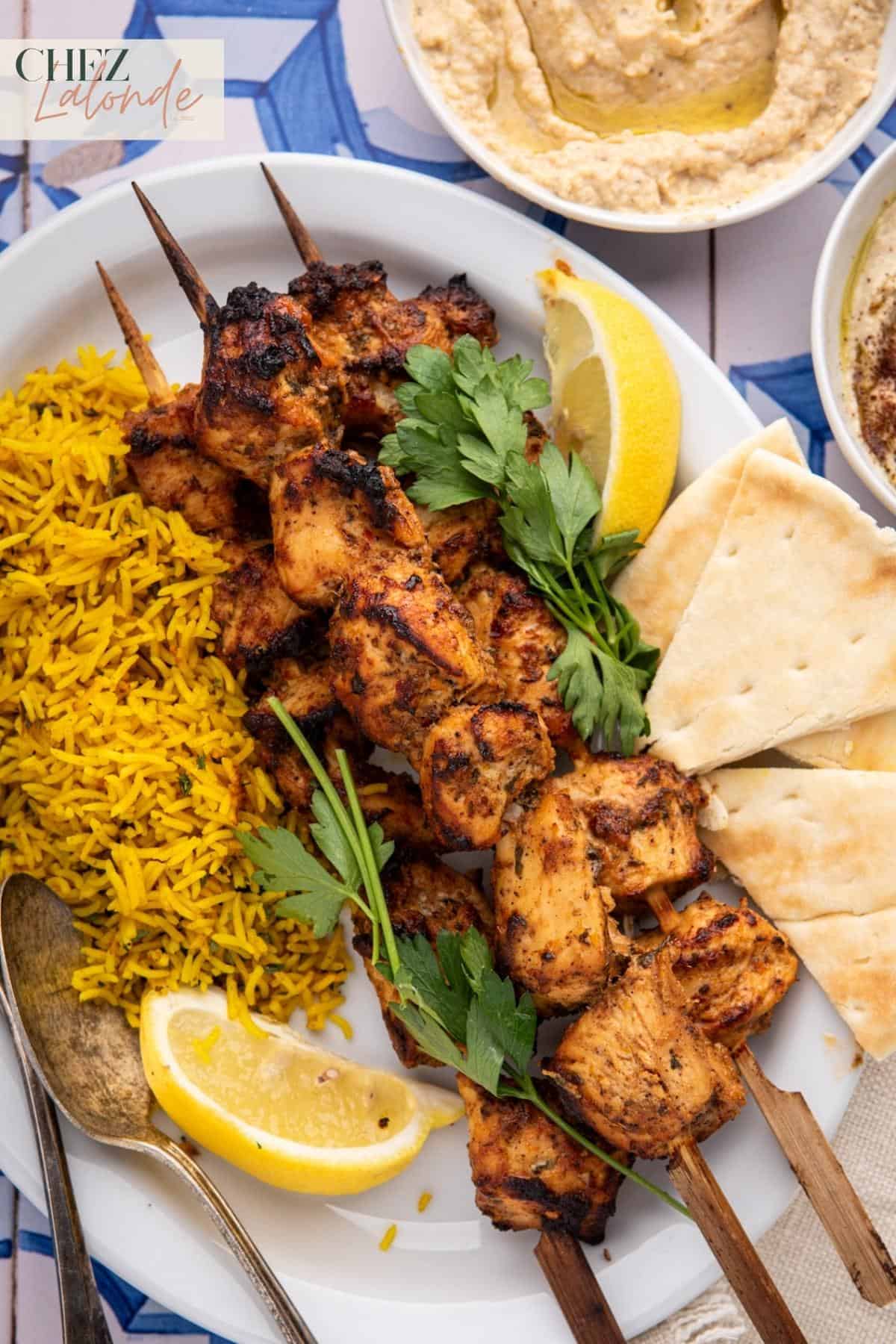 A plate of Shish tawook rice platter.