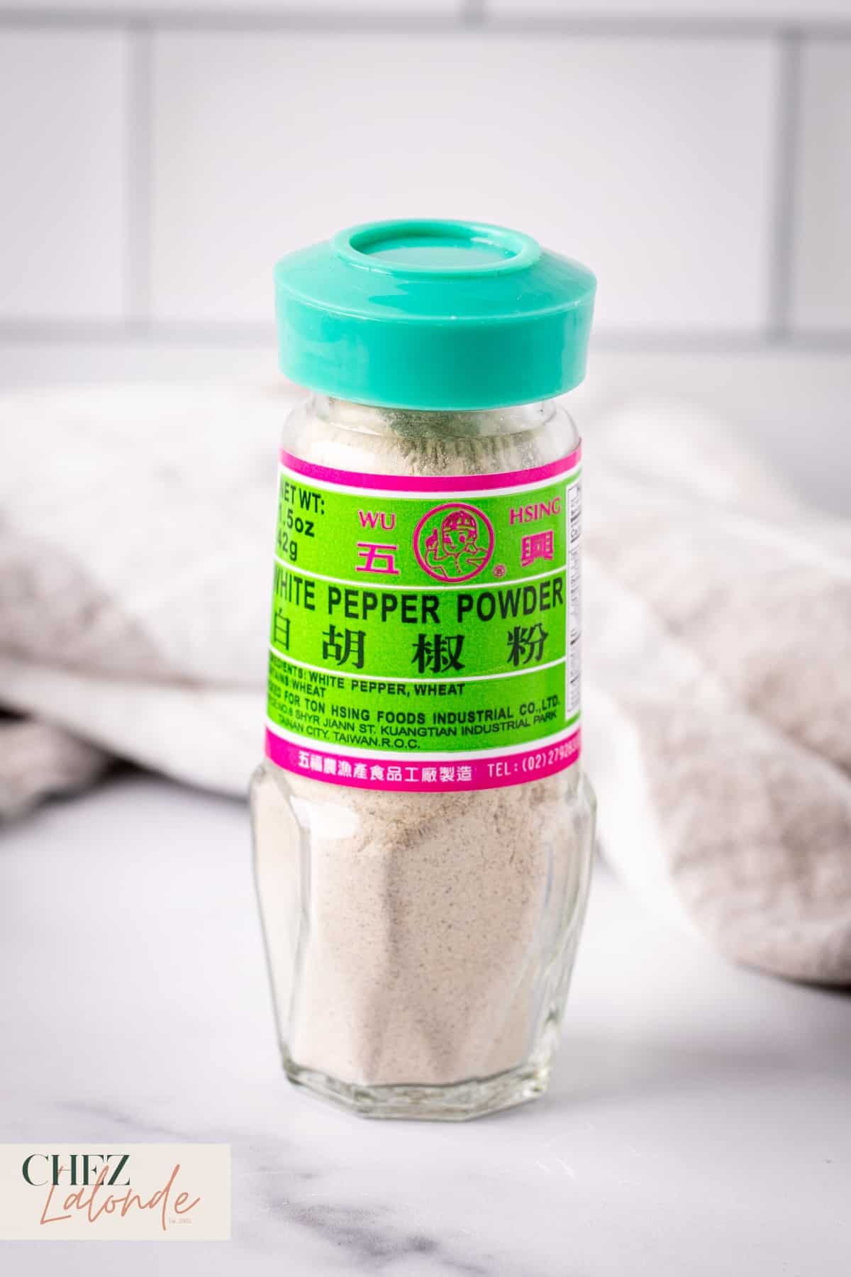 a bottle of white pepper powder. 
